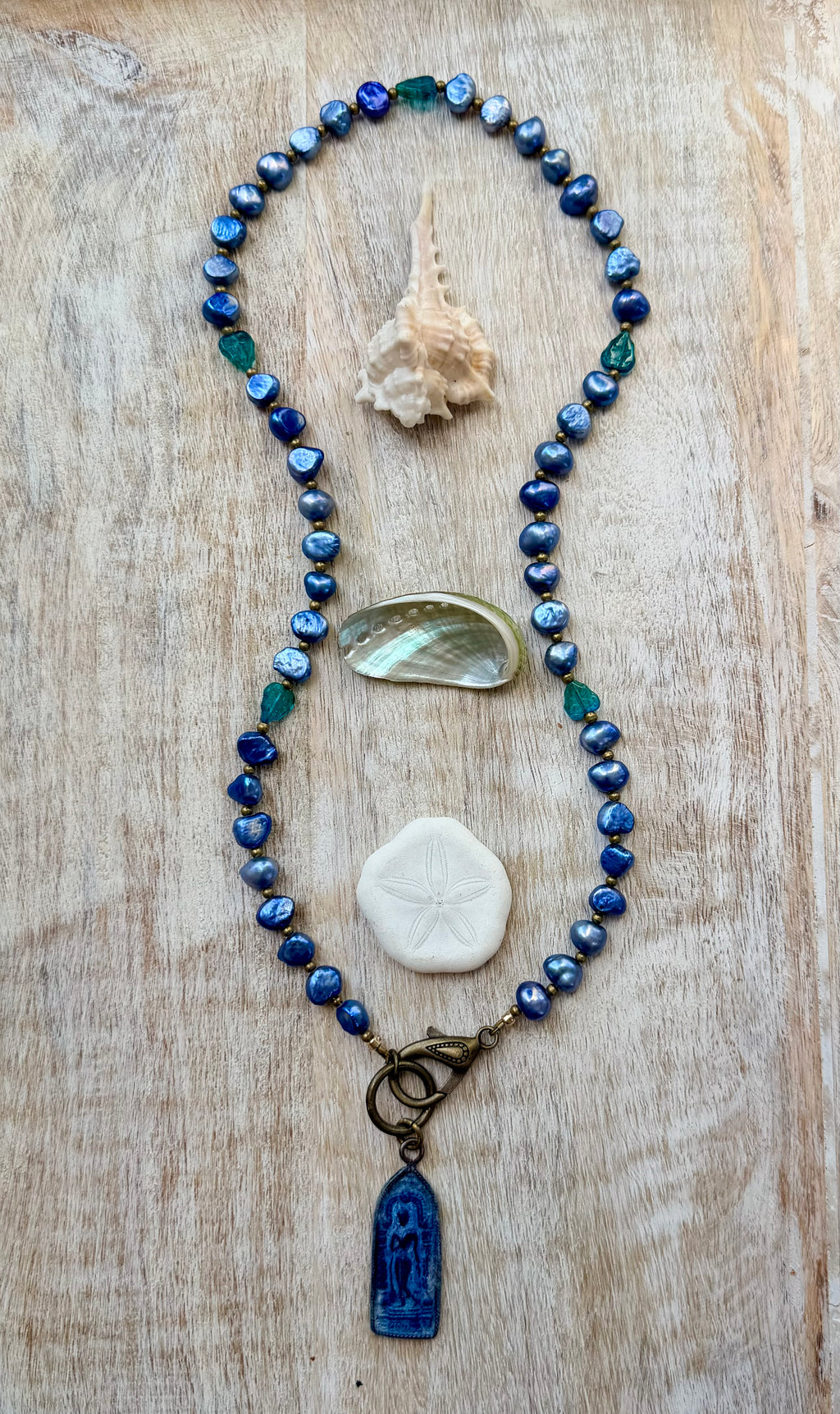 The San Juan Capistrano Pearl Buddha Necklace
