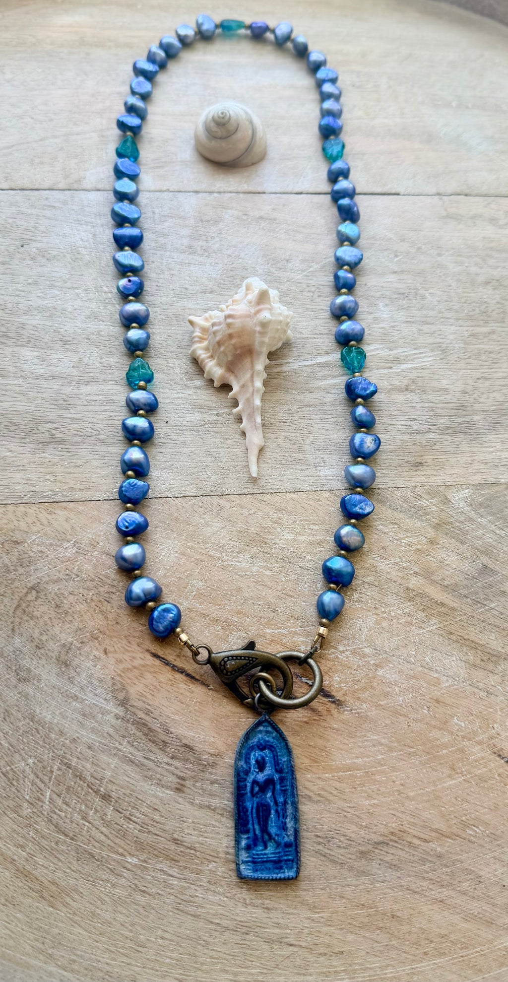 The San Juan Capistrano Pearl Buddha Necklace